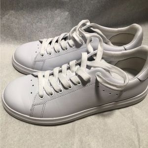 Tory Burch white sneakers , worn one time , small for me